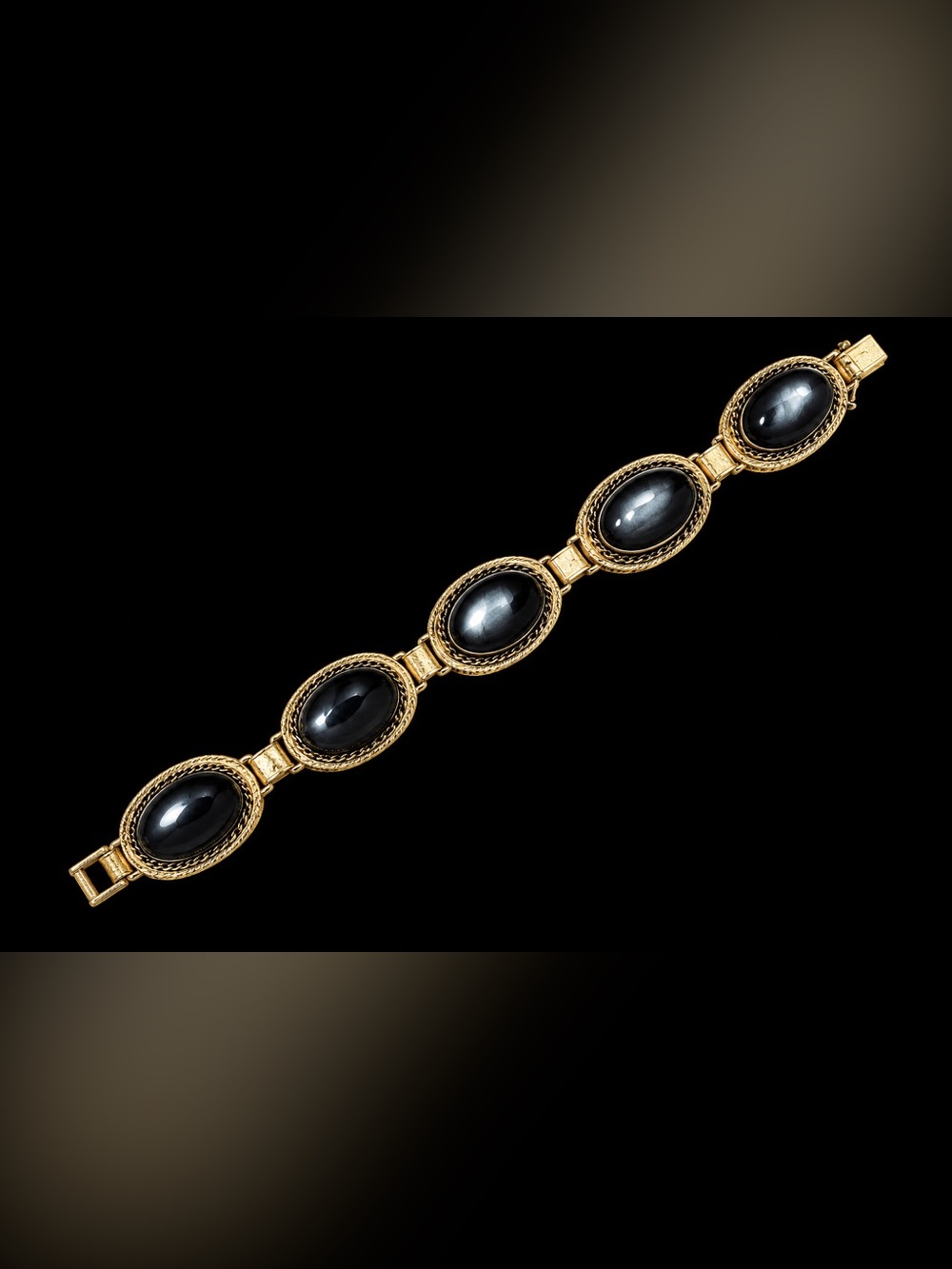 Whiting & Davis Gold-Tone Bracelet with Black Oval Cabochons